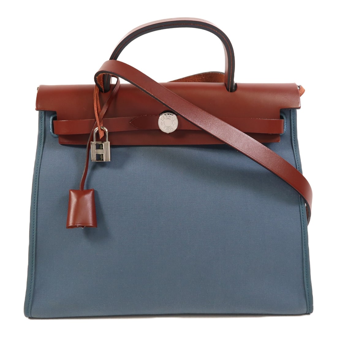 Hermes Herbag PM Canvas 2 Way Shoulder Handbag Bleu Tempete Rouge H: Hermes Herbag PM Canvas 2 Way Shoulder Handbag Bleu Tempete Rouge H Hermes Herbag PM 2 Way Shoulder Handbag in canvas with Bleu Tempete/Rouge H colorway. It features a belt hardware detail, one outsid