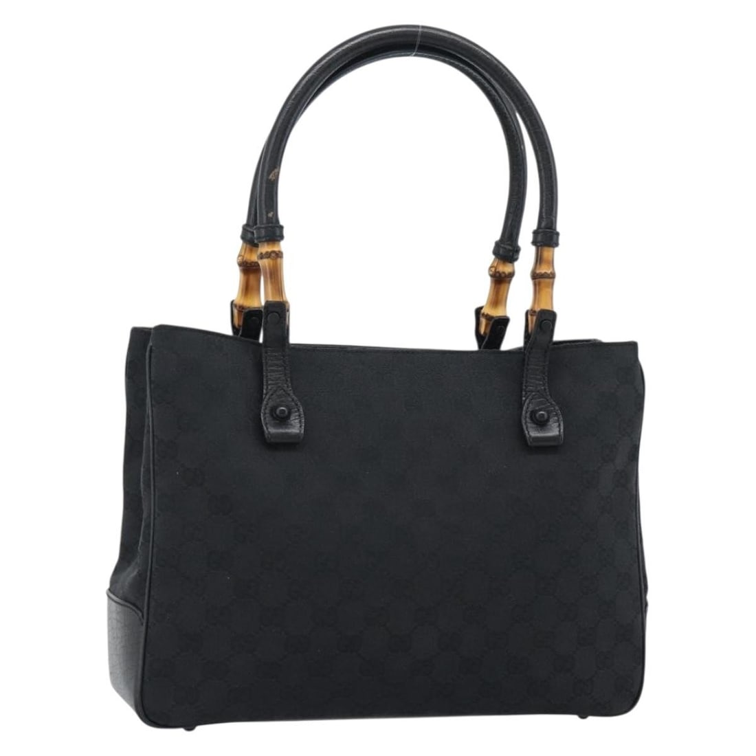 Gucci 112526 Black GG Canvas Bamboo Handle Handbag: Gucci 112526 Black GG Canvas Bamboo Handle Handbag Gucci handbag in black GG canvas with bamboo handle detailing. Made in Italy, this women's bag shows reasonable wear and tear consistent with a Rank 