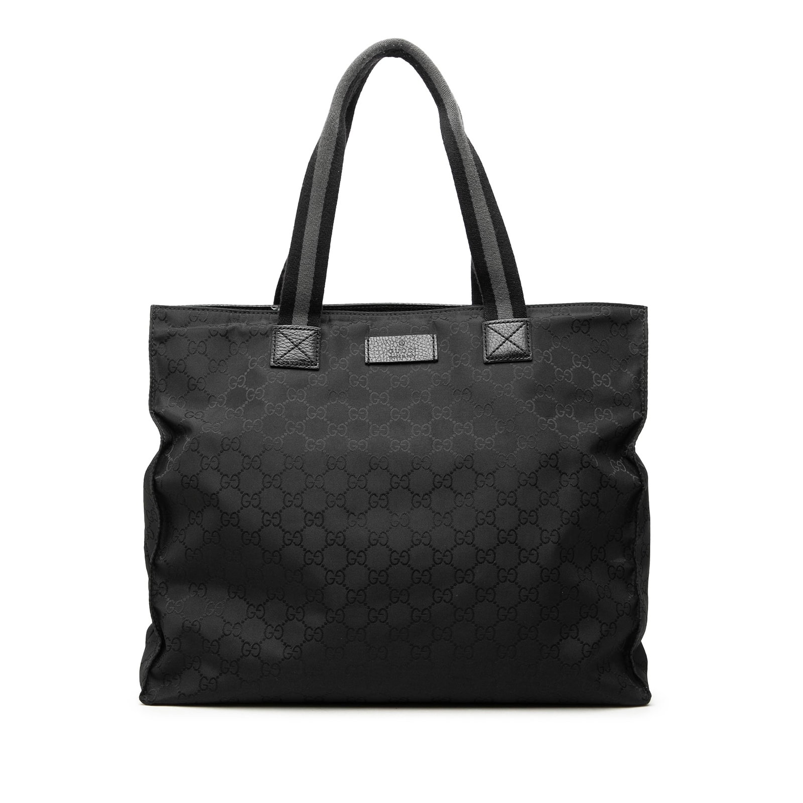 Gucci GG Web Nylon Tote Bag Black: Gucci GG Web Nylon Tote Bag Black Gucci GG Nylon Web Tote in black with a nylon body, flat canvas handles, an open top, and interior zip and slip pockets. Includes dust bag. Condition AB with noted we
