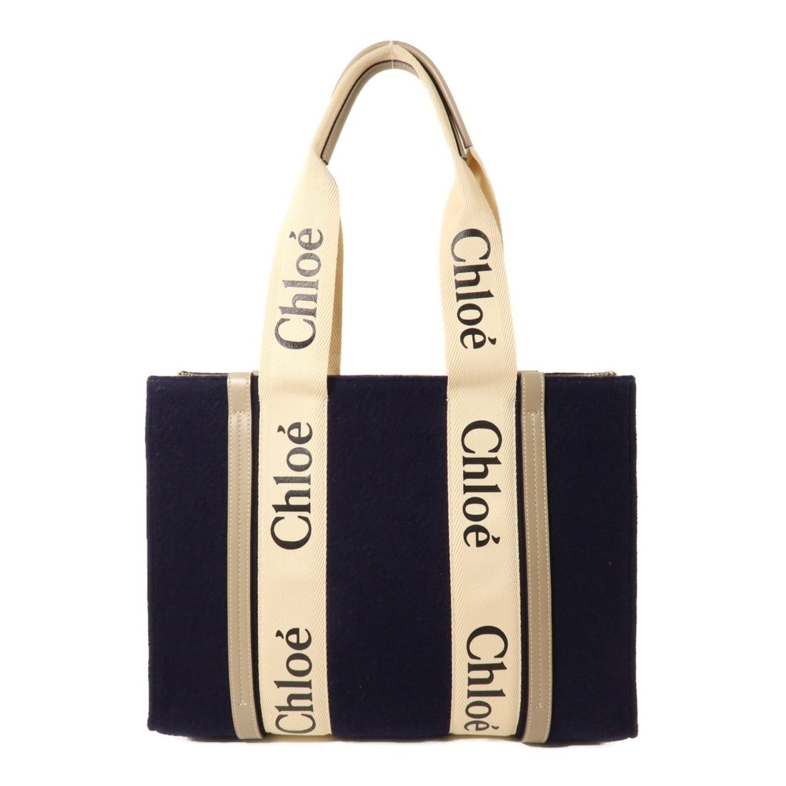 CHLOE Woody wool canvas medium tote in black navy beige: CHLOE Woody wool canvas medium tote in black navy beige CHLOE Woody Medium Tote Bag in black, navy, and beige wool and canvas. This medium tote features a single open inside pocket and comes with a st
