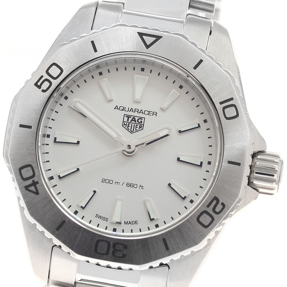 Women's TAG HEUER Aquaracer WBP1411 Quartz Stainless Steel Watch: Women's TAG HEUER Aquaracer WBP1411 Quartz Stainless Steel Watch TAG Heuer Aquaracer women's wristwatch with quartz movement and a silver dial. This pre-owned Swiss-made watch features a stainless ste