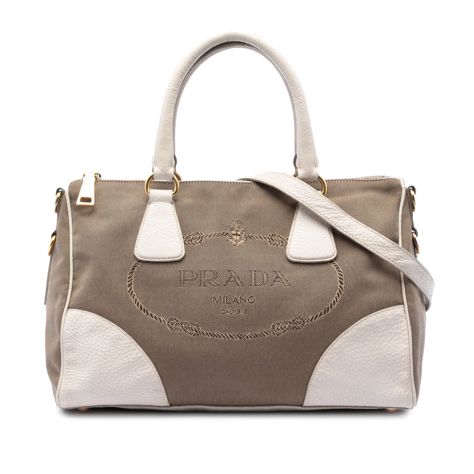 Prada Canapa Logo Brown Canvas Satchel with Leather Trim: Prada Canapa Logo Brown Canvas Satchel with Leather Trim This Prada Vitello Daino Trimmed Canvas Canapa Logo Satchel features a durable canvas body accented with leather trim, rolled leather handles, 