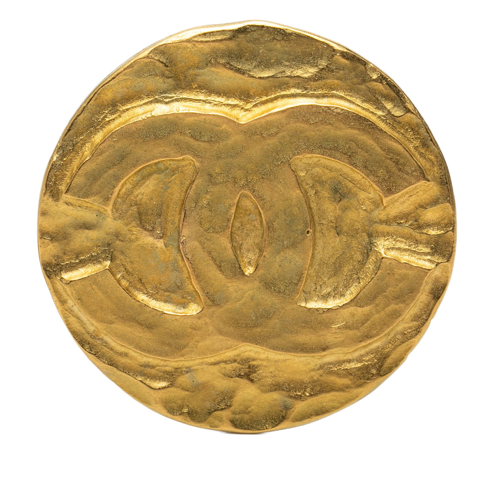 Chanel CC Round Gold Tone Metal Brooch: Chanel CC Round Gold Tone Metal Brooch Gold-tone round brooch with a back pin closure. The piece is described as costume jewelry and originates from France. Condition is AB, with discoloration and scr