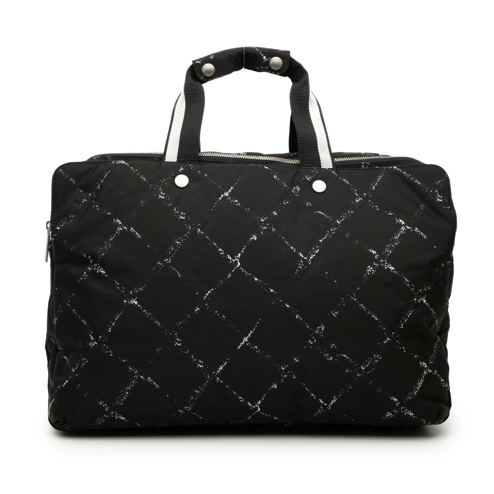 Chanel Old Travel Line Black Nylon Zip Travel Bag: Chanel Old Travel Line Black Nylon Zip Travel Bag This Chanel Old Travel Line travel bag is crafted with a nylon body and flat nylon handles, finished with a top zip closure and interior open pockets.