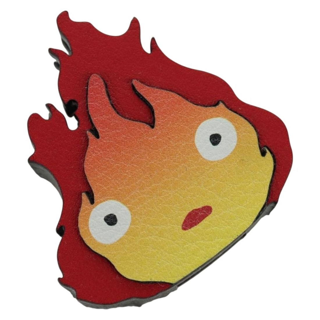 LOEWE Calcifer Leather Charm Red Howl's Moving Castle: LOEWE Calcifer Leather Charm Red Howl's Moving Castle A red leather charm in the Calcifer design from the Studio Ghibli Howl's Moving Castle collaboration. It is made in Spain and comes with a dust ba
