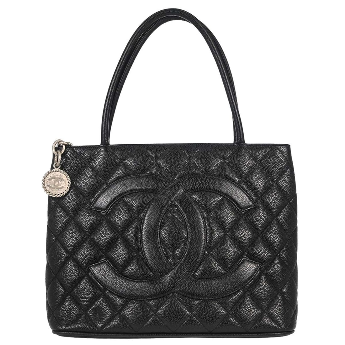 CHANEL Medallion medium tote in black caviar leather: CHANEL Medallion medium tote in black caviar leather Chanel Medallion tote handbag in black caviar skin leather with matelasse quilting, double handles, and a zip-top closure. The bag features an exte