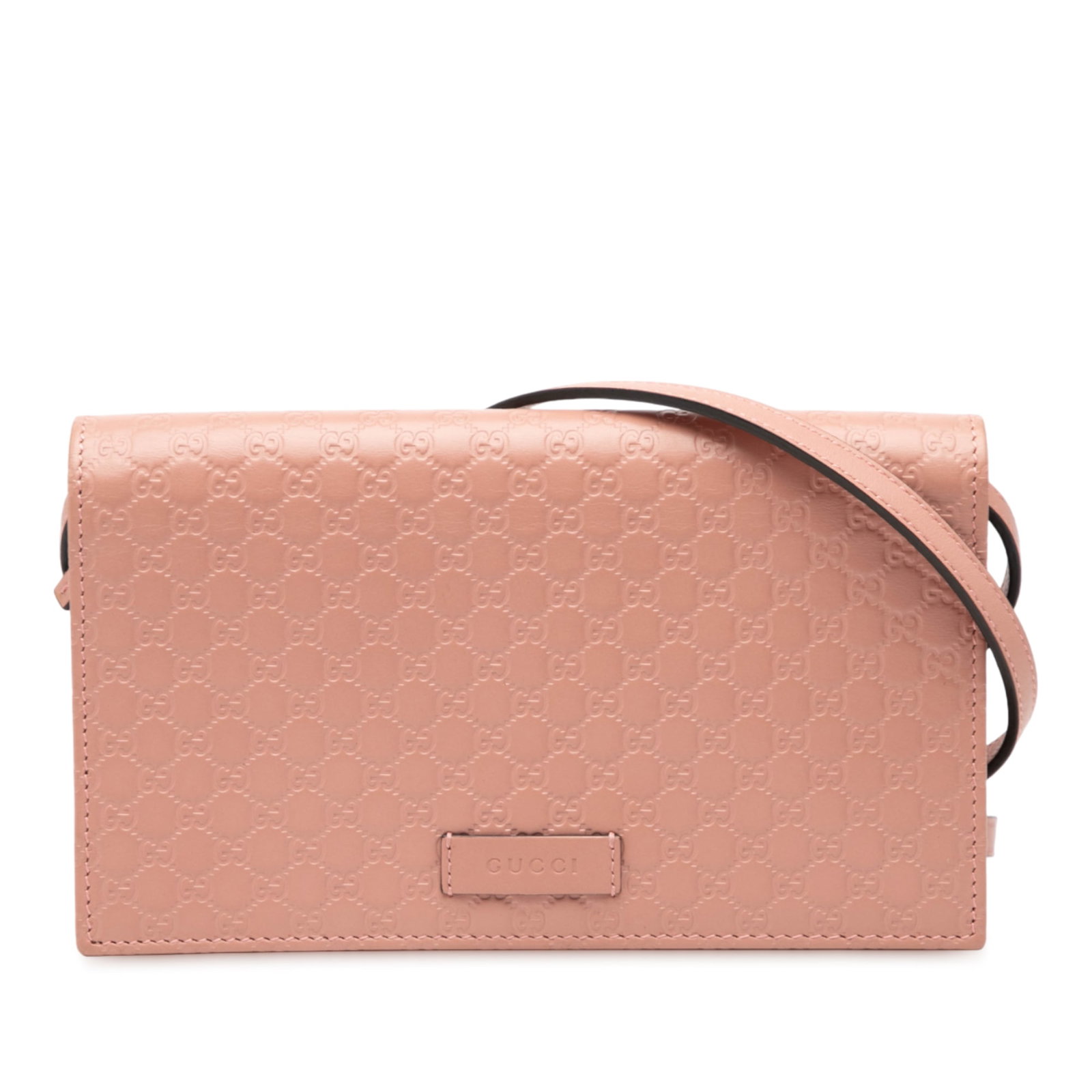 Gucci Microguccissima Pink Leather Crossbody Wallet Bag with Strap: Gucci Microguccissima Pink Leather Crossbody Wallet Bag with Strap This Gucci Microguccissima Wallet on Strap is a crossbody bag crafted from embossed pink leather. It features a flat leather strap, a