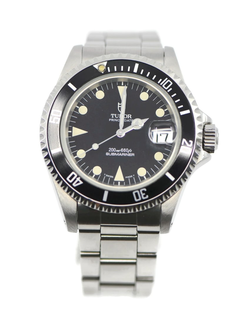 Tudor Submariner 79190 Black Dial Stainless Steel Wristwatch: Tudor Submariner 79190 Black Dial Stainless Steel Wristwatch This is a pre-owned Tudor Submariner wristwatch, reference 79190. Crafted in Switzerland, it features a 40mm stainless steel case and match