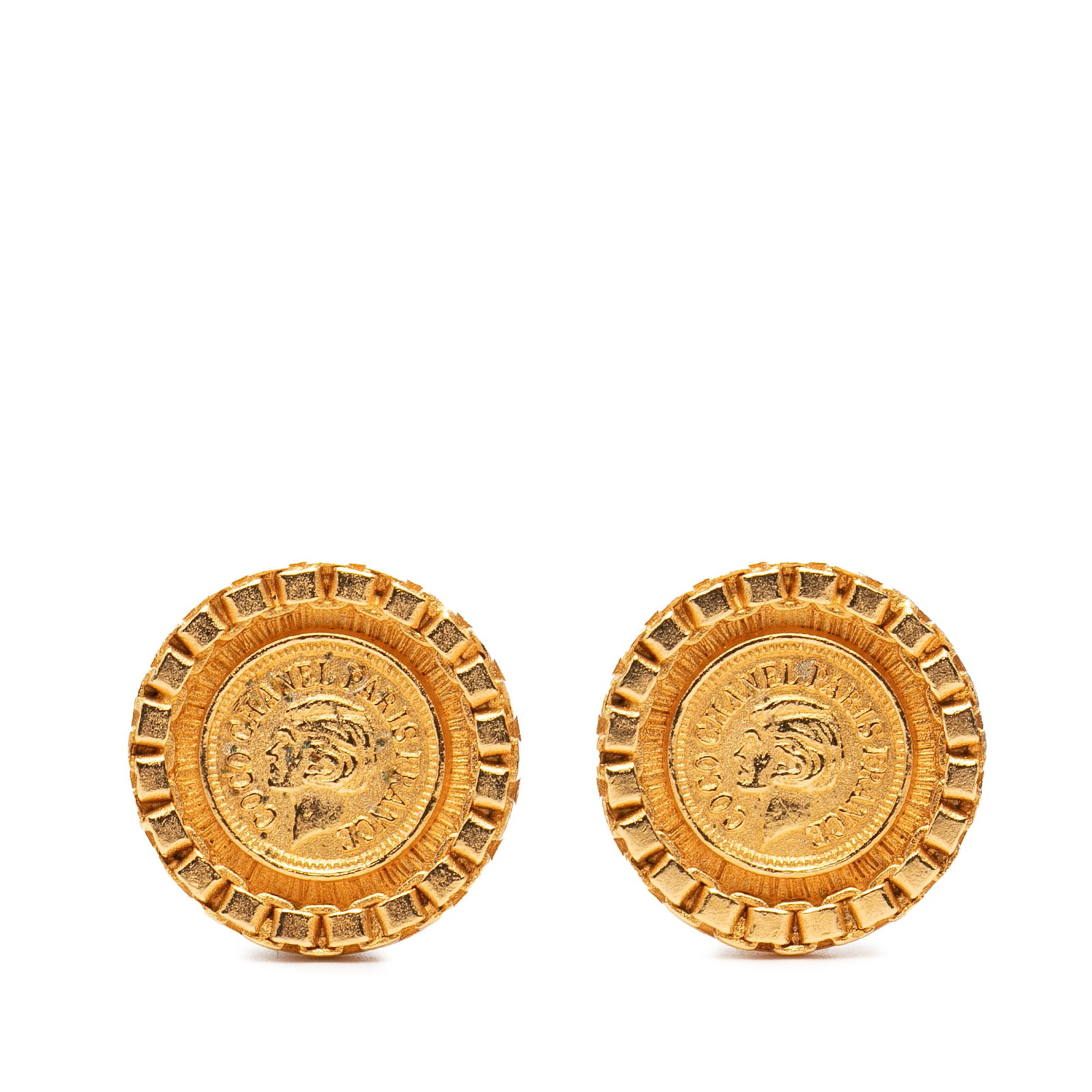 Chanel Coin Motif Gold Plated Clip Earrings: Chanel Coin Motif Gold Plated Clip Earrings These Chanel clip-on earrings feature a gold-plated metal body with a Coco coin motif. They are designed for non-pierced ears and originate from France. The