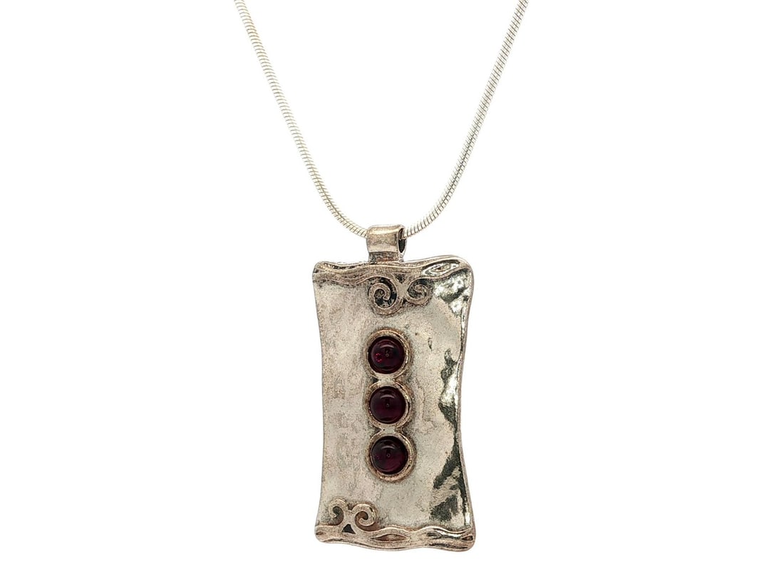 Handmade Sterling Silver Garnet Pendant on Round Snake Chain: Handmade Sterling Silver Garnet Pendant on Round Snake Chain This exquisite handmade necklace features a stunning pendant crafted from sterling silver, showcasing three natural garnets in a deep red h