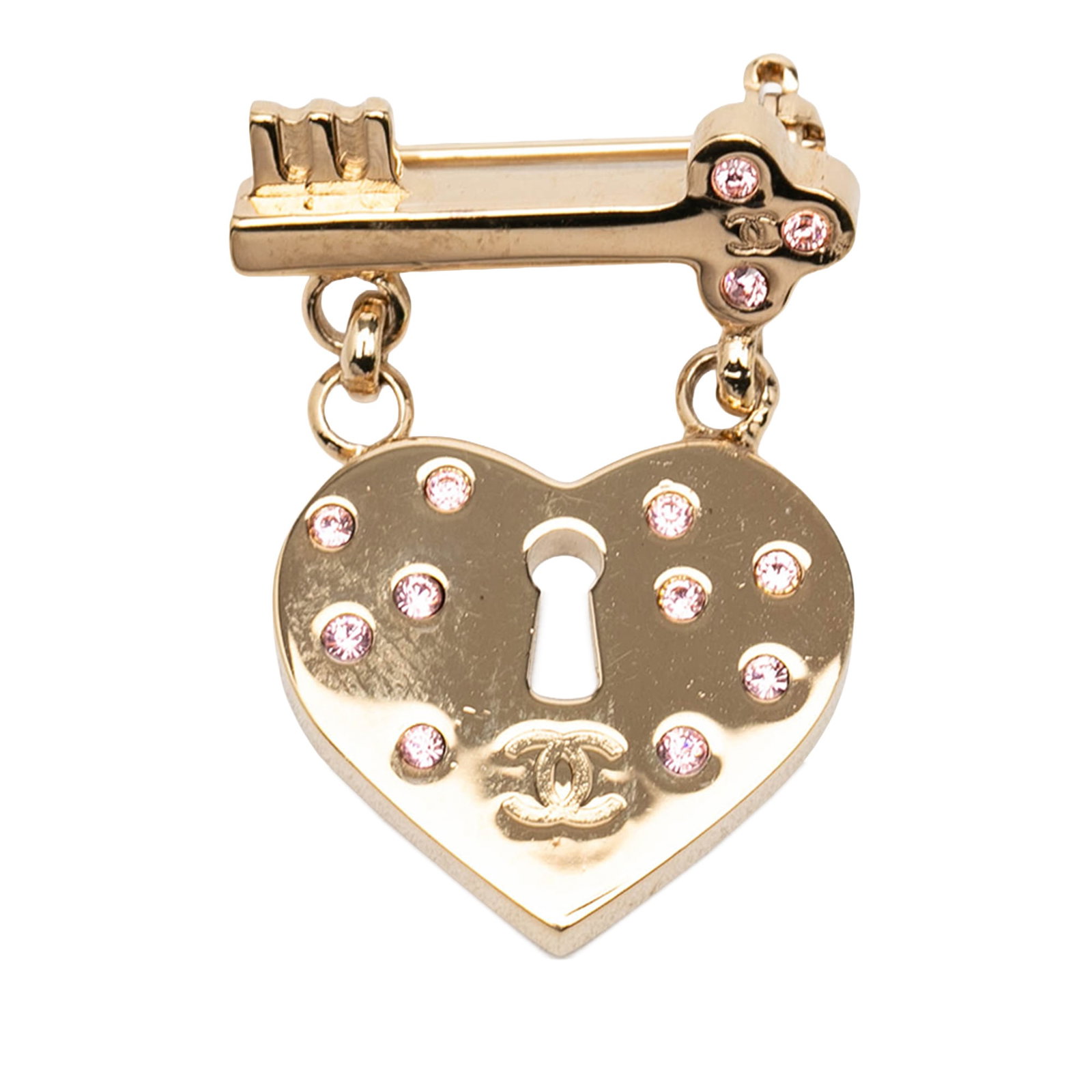 Chanel CC Heart Lock and Key Brooch Gold Plated Strass: Chanel CC Heart Lock and Key Brooch Gold Plated Strass Chanel CC Gold Plated Strass Heart Lock and Key Brooch in costume jewelry style, featuring a gold-plated metal body, crystal embellishments, and 