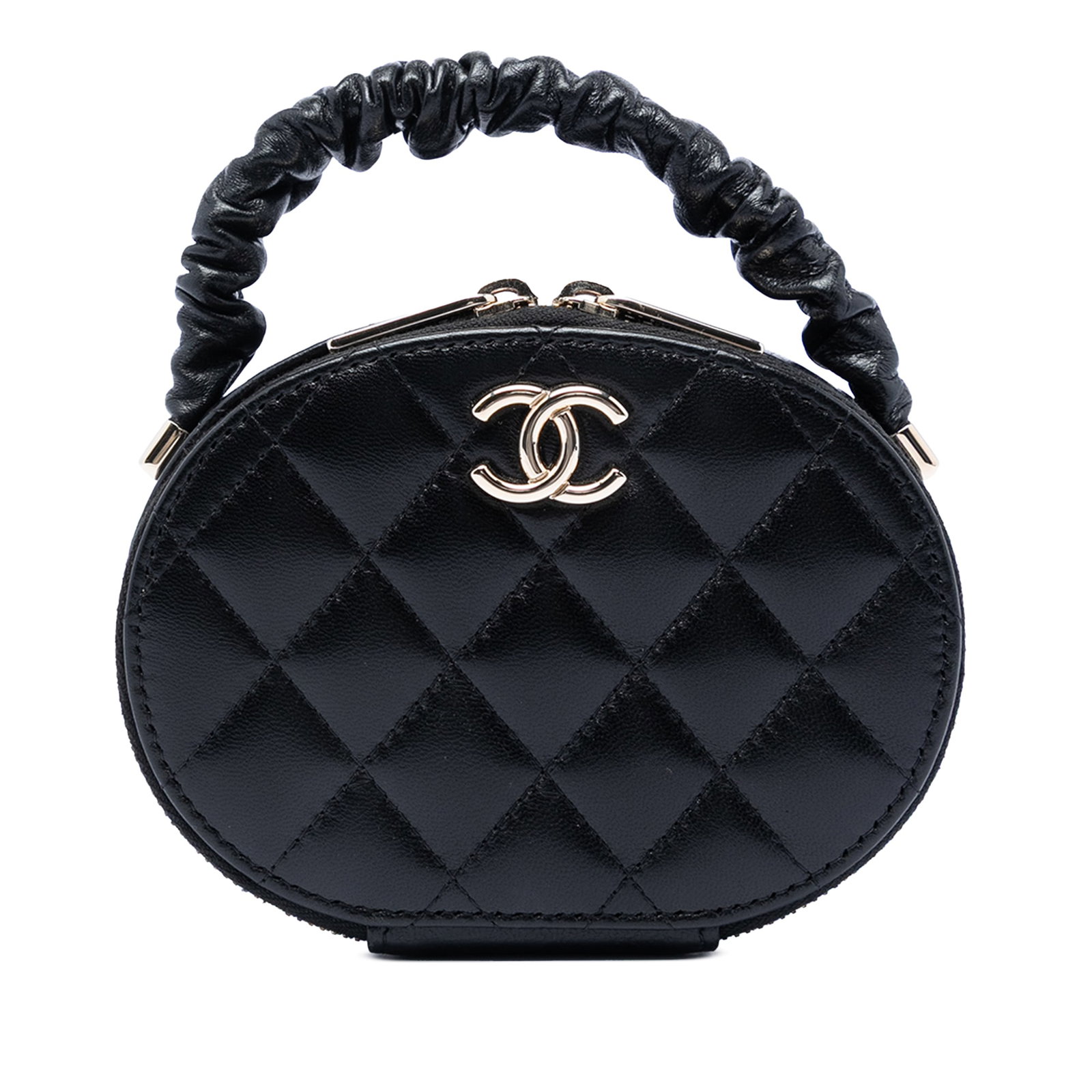 Chanel CC Oval Top Handle Clutch in Black Quilted Lambskin: Chanel CC Oval Top Handle Clutch in Black Quilted Lambskin Chanel CC Quilted Lambskin Oval Top Handle Clutch in black, made in Italy. This bag features quilted lambskin leather, a rolled handle, a zip