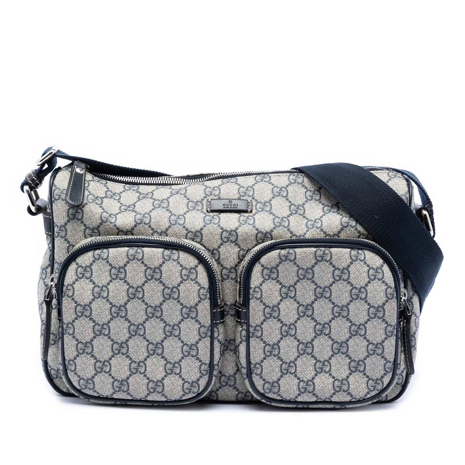 Gucci GG Supreme coated canvas crossbody bag: Gucci GG Supreme coated canvas crossbody bag This Gucci GG Supreme Double Pocket Crossbody bag features a coated canvas body with leather trim, an adjustable flat shoulder strap, a top zip closure, tw