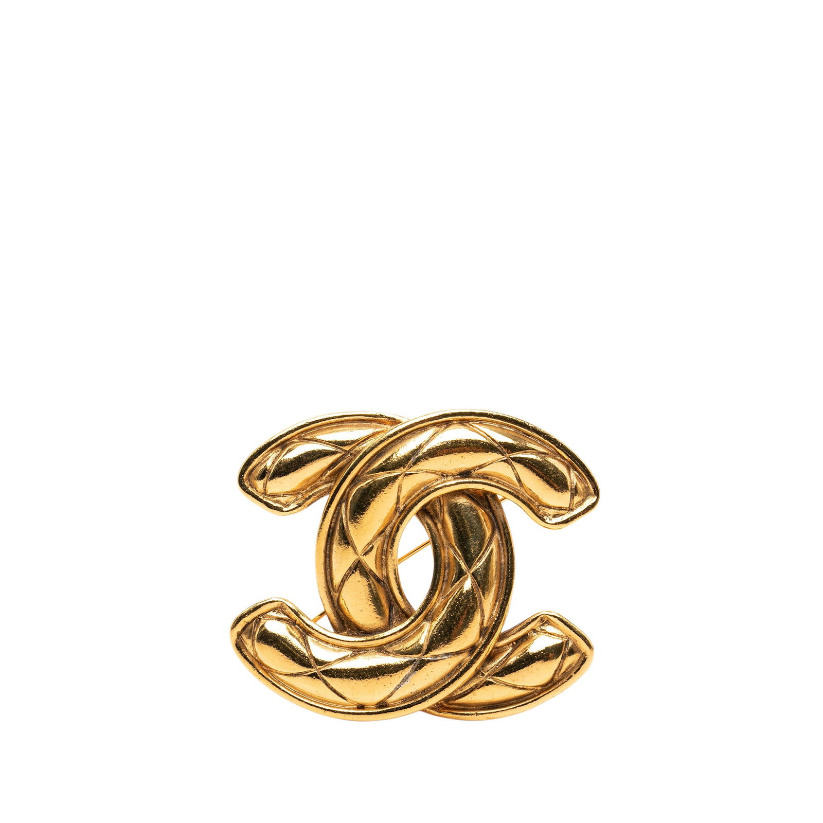 Chanel CC Quilted Gold Tone Metal Brooch: Chanel CC Quilted Gold Tone Metal Brooch Chanel CC Gold Plated Quilted Brooch in gold-tone metal with a back pin closure. It is a costume accessory made in France and measures 4.80 cm in length and 5.
