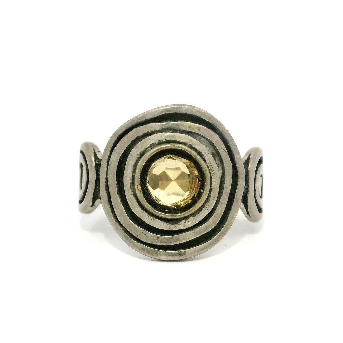 Handmade Sterling Silver Citrine Swirl Band Ring Lab-Created 7.5: Handmade Sterling Silver Citrine Swirl Band Ring Lab-Created 7.5 This exquisite Handmade Sterling Silver Band Ring features a stunning lab-created round faceted citrine gemstone, set in a stylish targ