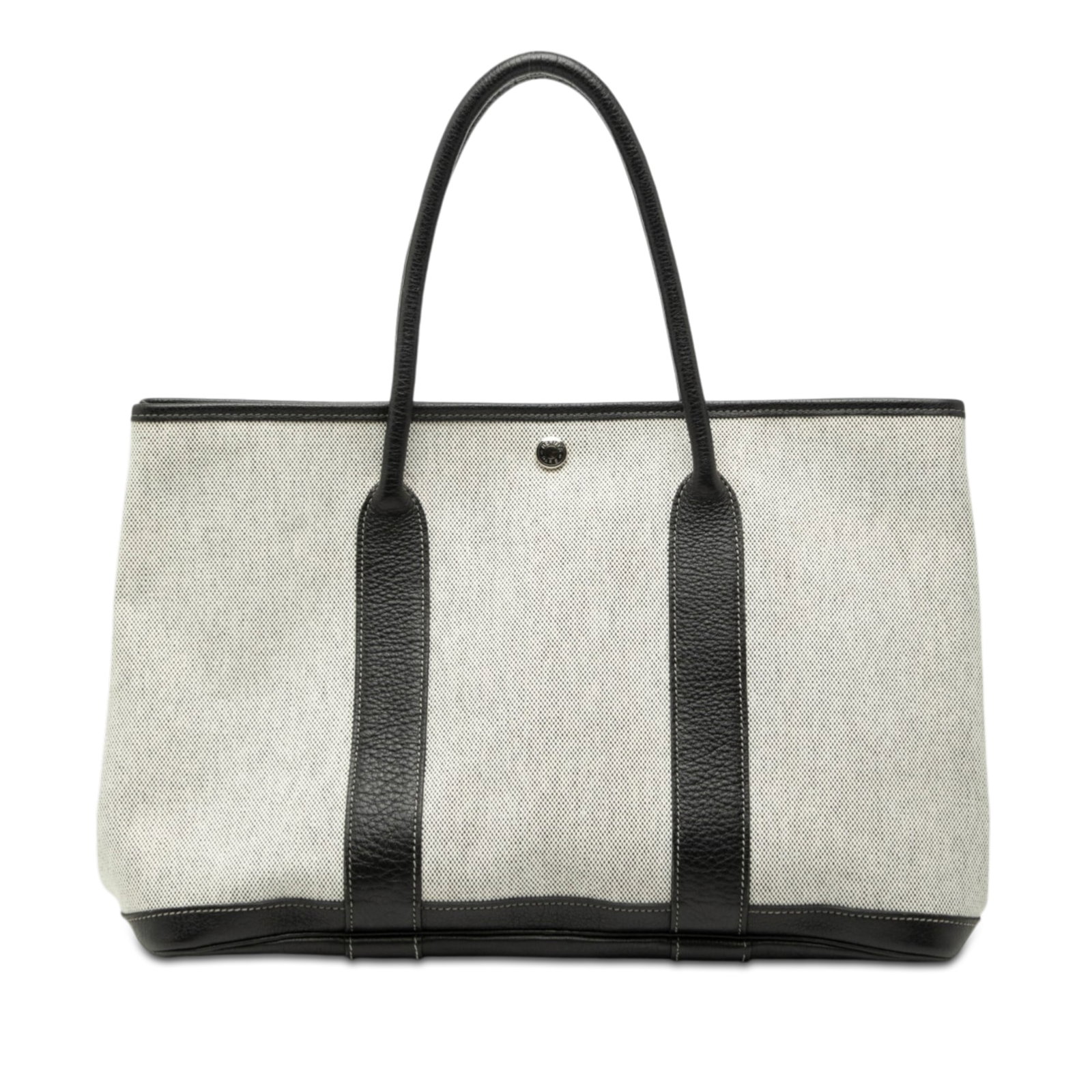 Hermes Garden Party 36 Canvas and Leather Tote Gray: Hermes Garden Party 36 Canvas and Leather Tote Gray This Hermes Garden Party 36 features a canvas body with textured leather accents and rolled leather handles. It is equipped with a top snap button c