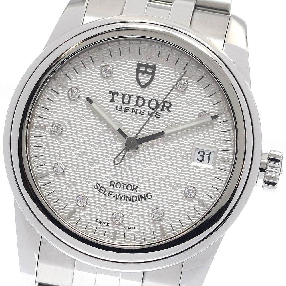 TUDOR Glamour 55000 automatic mens stainless steel date watch: TUDOR Glamour 55000 automatic mens stainless steel date watch Pre-owned TUDOR Glamour Date men's wristwatch with automatic movement and date function. It features a silver dial, stainless steel case a
