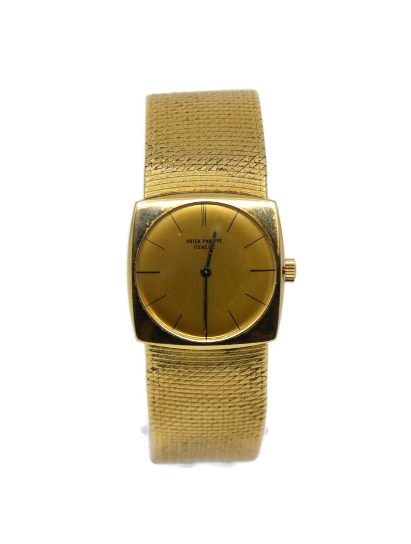 Patek Philippe Vintage 18K Yellow Gold Wristwatch Ref 3523: Patek Philippe Vintage 18K Yellow Gold Wristwatch Ref 3523 Discover the elegance of this vintage Patek Philippe wristwatch, crafted from luxurious 18K yellow gold. This exquisite timepiece features a 