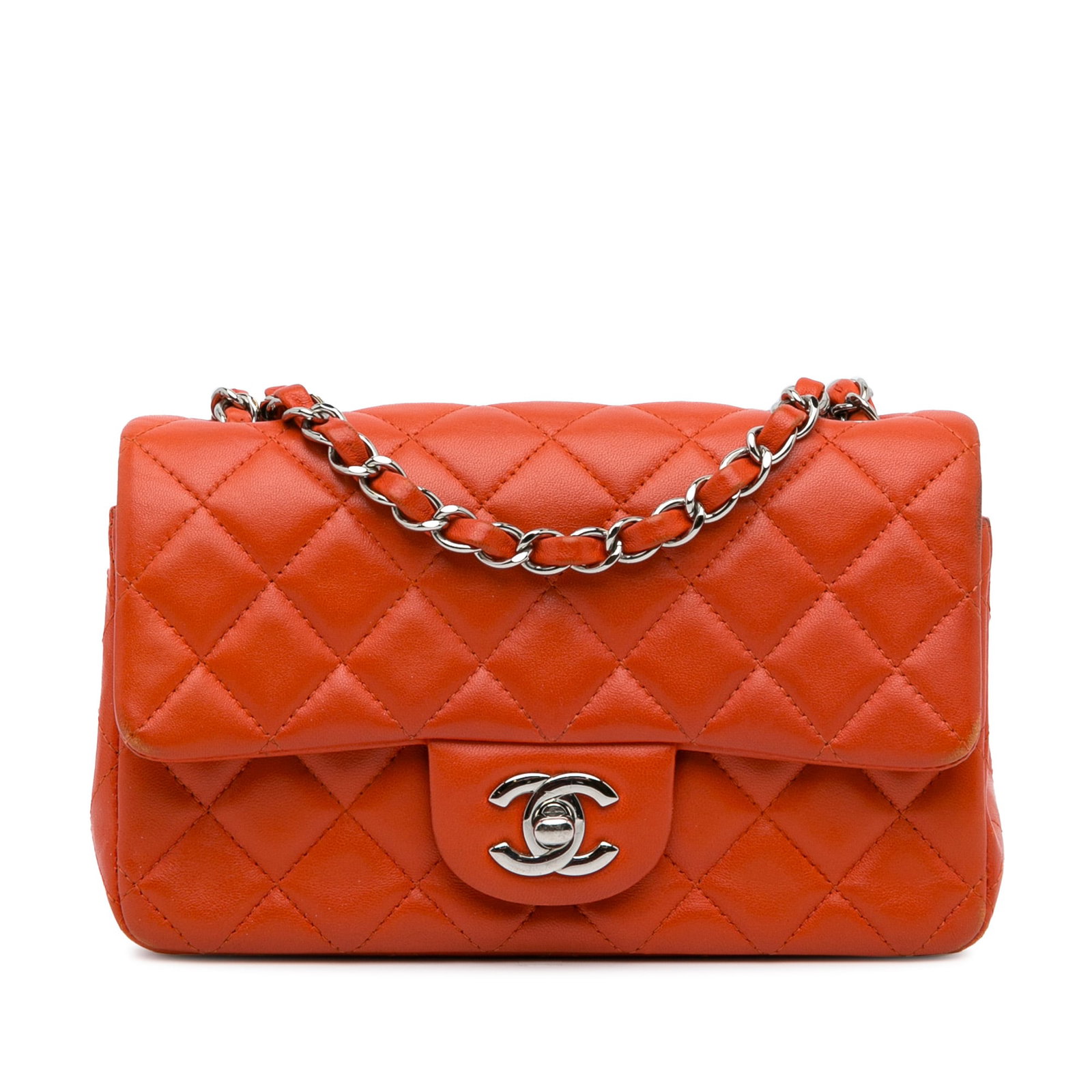 Chanel Mini Rectangular Classic Lambskin Flap Bag Orange: Chanel Mini Rectangular Classic Lambskin Flap Bag Orange Introducing the Chanel Mini Rectangular Classic Lambskin Single Flap, a luxurious and stylish flap bag crafted from premium quilted lambskin. T