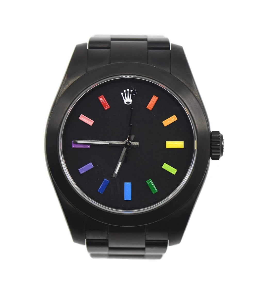 Rolex Milgauss 116400 MAD Paris customized stainless steel wristwatch: Rolex Milgauss 116400 MAD Paris customized stainless steel wristwatch Customized Rolex Milgauss MAD Paris wristwatch with an automatic movement and analog display. This pre-owned men's watch features 