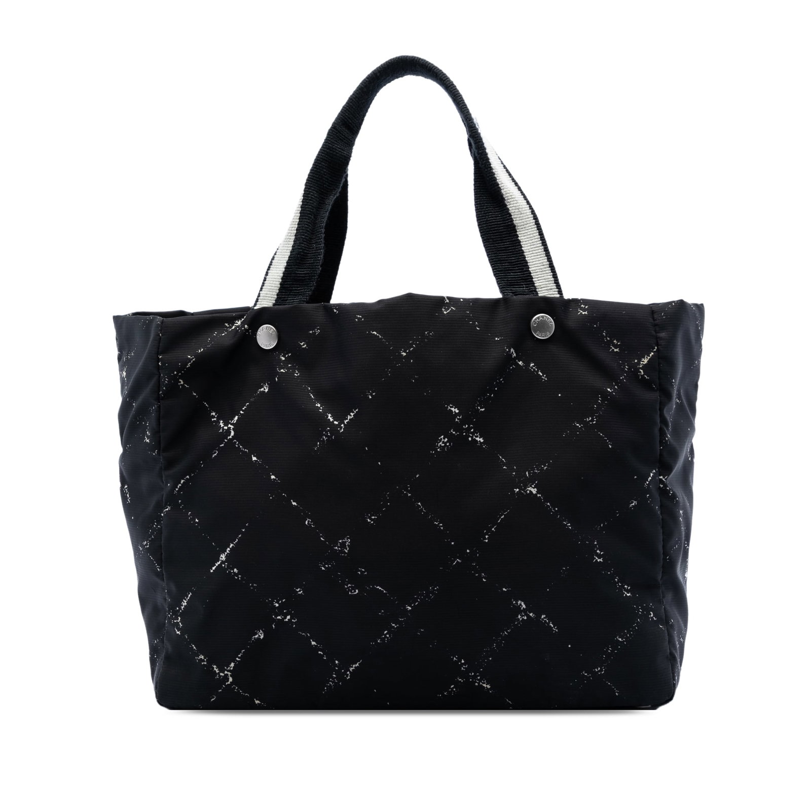 Chanel Old Travel Line Black Nylon Tote Bag: Chanel Old Travel Line Black Nylon Tote Bag This Chanel Old Travel Line tote is crafted with a nylon body and features flat straps, an open top, and interior zip pockets. Finished in black, it is made