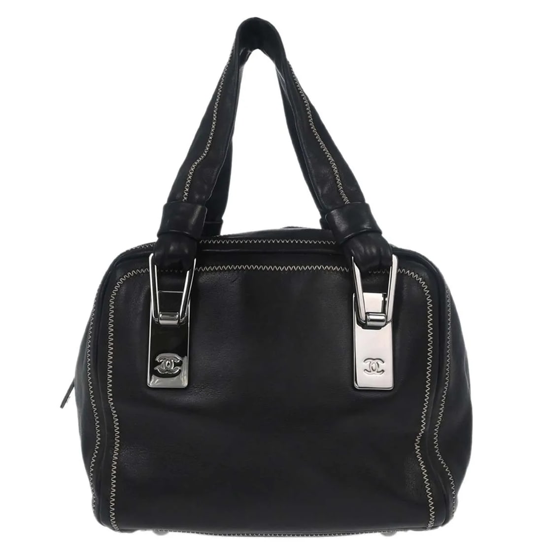 Black Leather CC Bowler Bag by Chanel 16cm x 15cm x 20cm: Black Leather CC Bowler Bag by Chanel 16cm x 15cm x 20cm This Chanel CC Bowler bag is crafted from black leather and features a classic design suitable for women. It is made in France and offers a com