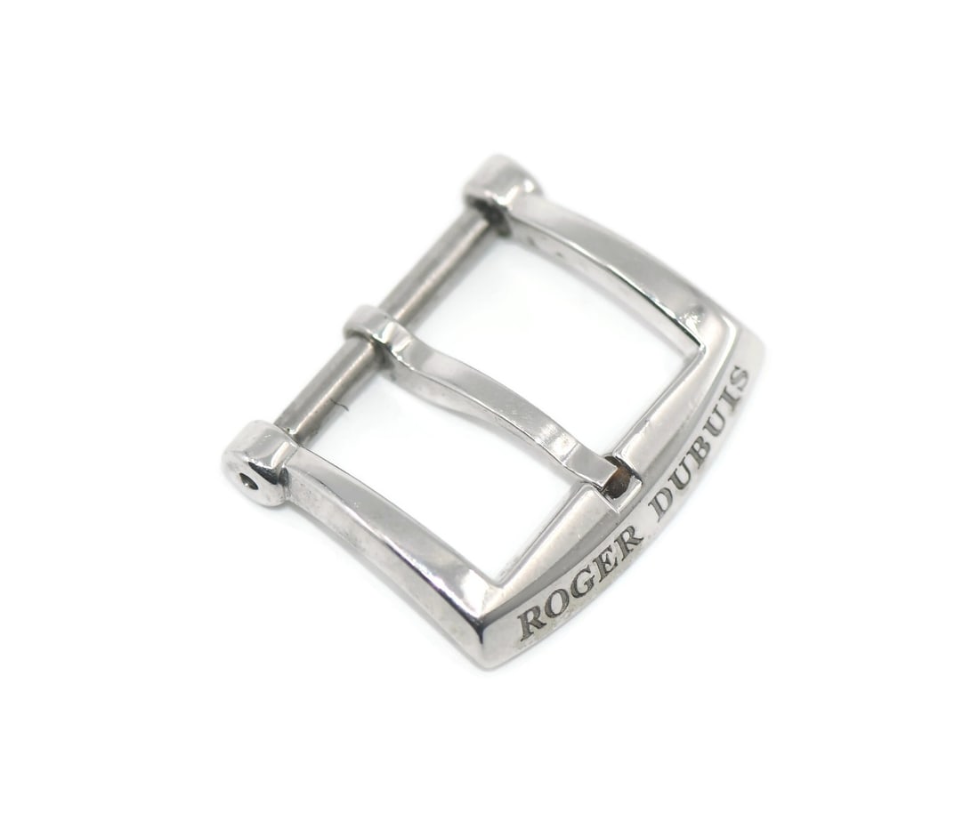 Roger Dubuis 14mm 18K White Gold Wristwatch Buckle: Roger Dubuis 14mm 18K White Gold Wristwatch Buckle This Roger Dubuis wristwatch band buckle is crafted from 18K white gold and has a 14mm width. Made in Switzerland, it is a genuine Roger Dubuis acces