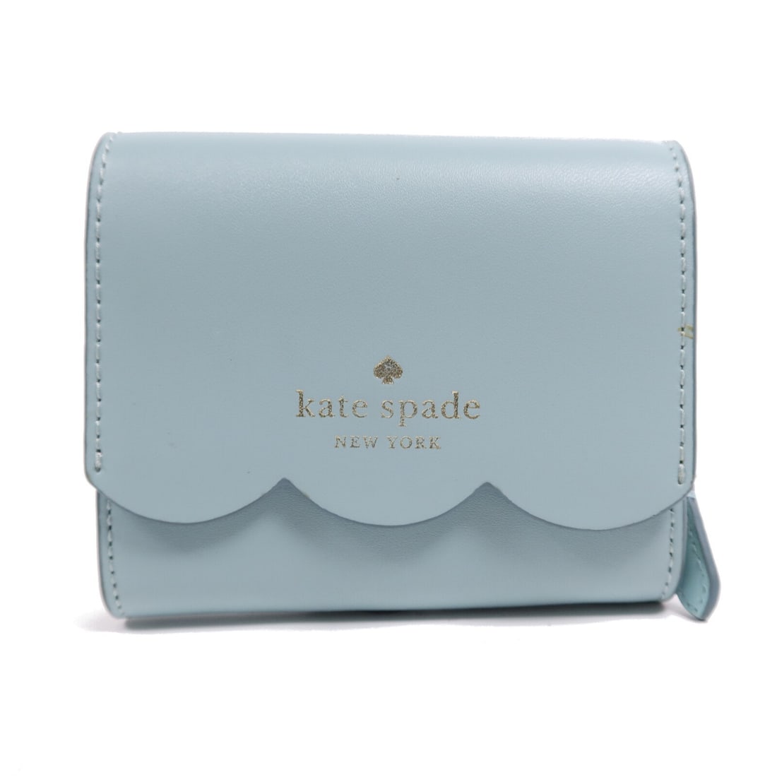 Kate Spade blue lambskin bi fold wallet for women: Kate Spade blue lambskin bi fold wallet for women Kate Spade bi-fold wallet in blue lambskin (sheep leather) with a regular women's size profile. It features a hook button closure, one coin case, four
