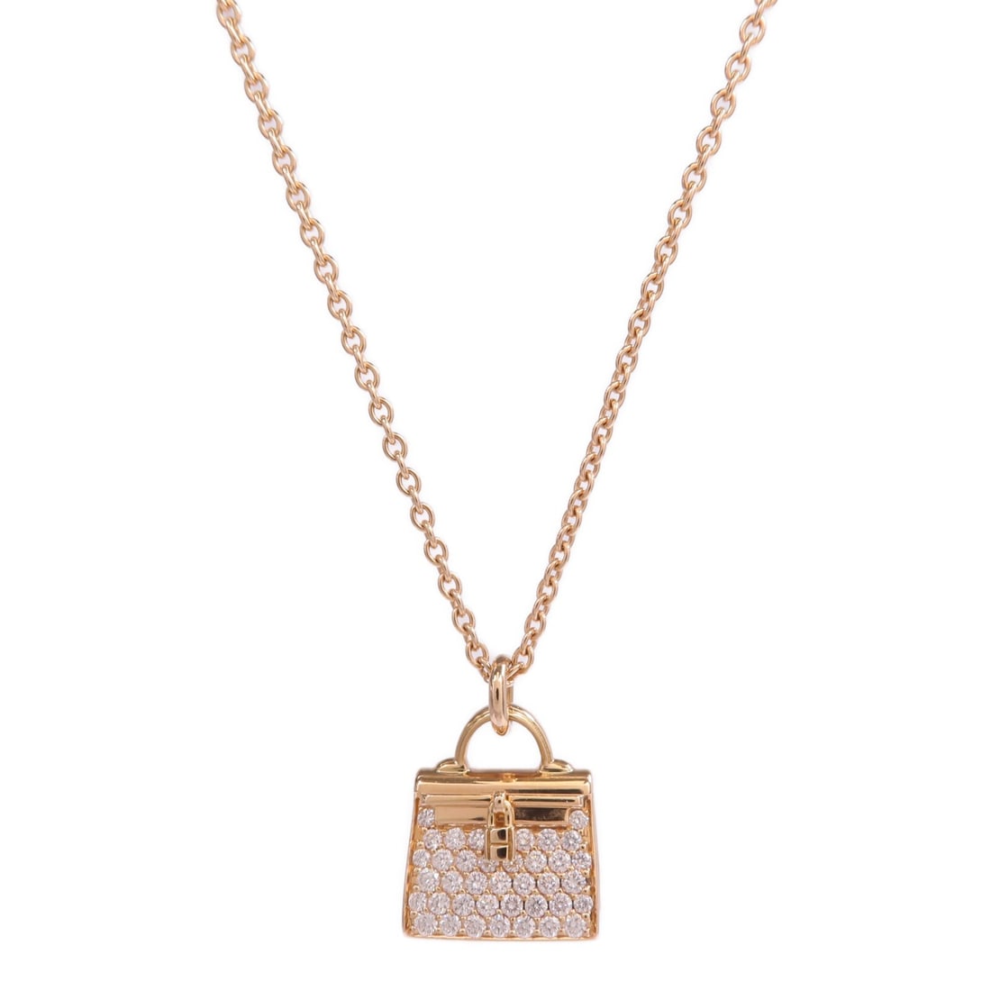 Hermes Amulettes Kelly Diamond Necklace 18K Rose Gold: Hermes Amulettes Kelly Diamond Necklace 18K Rose Gold Hermes Amulettes Kelly Pendant Necklace in 18K pink gold with diamond accents. This women's necklace is described as clear in color and made in Fr