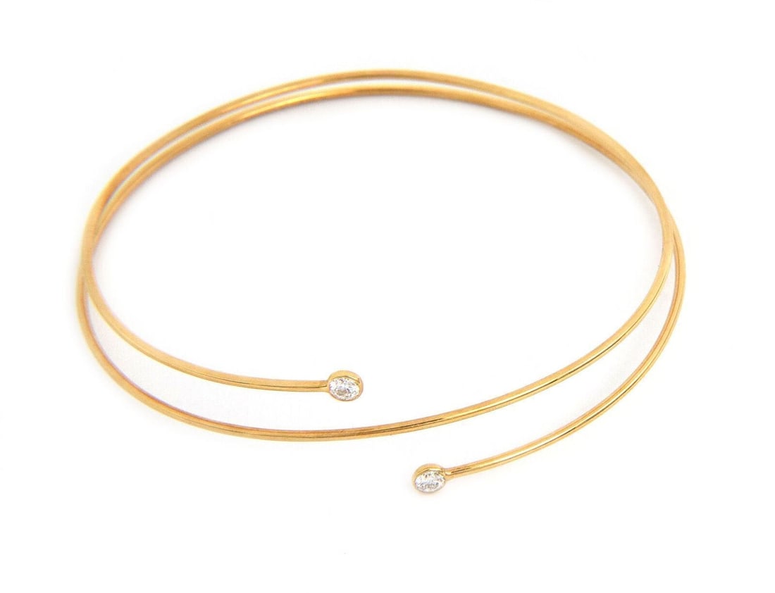 Tiffany Co Elsa Peretti Diamond Hoop 18k Gold Bracelet: Tiffany Co Elsa Peretti Diamond Hoop 18k Gold Bracelet A pre-owned Elsa Peretti Diamond Hoop bracelet designed for Tiffany & Co., crafted in 18k yellow gold and accented with an approximately 0.23 ct 