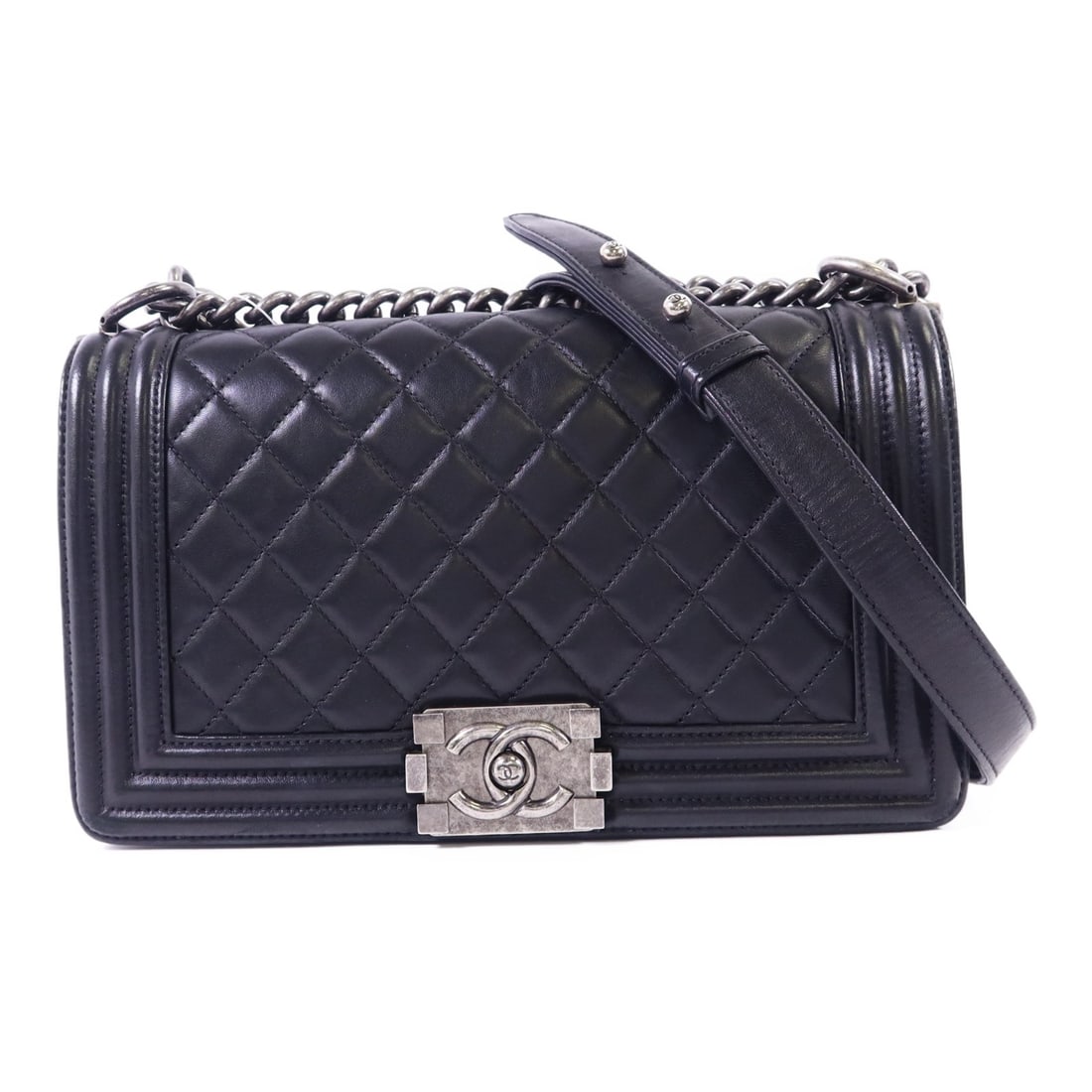 CHANEL Boy 25 black calfskin leather shoulder bag: CHANEL Boy 25 black calfskin leather shoulder bag CHANEL Boy 25 shoulder bag in black calfskin leather. It features black-on-black coloring, belt hardware, one inside open pocket, and comes with a hol