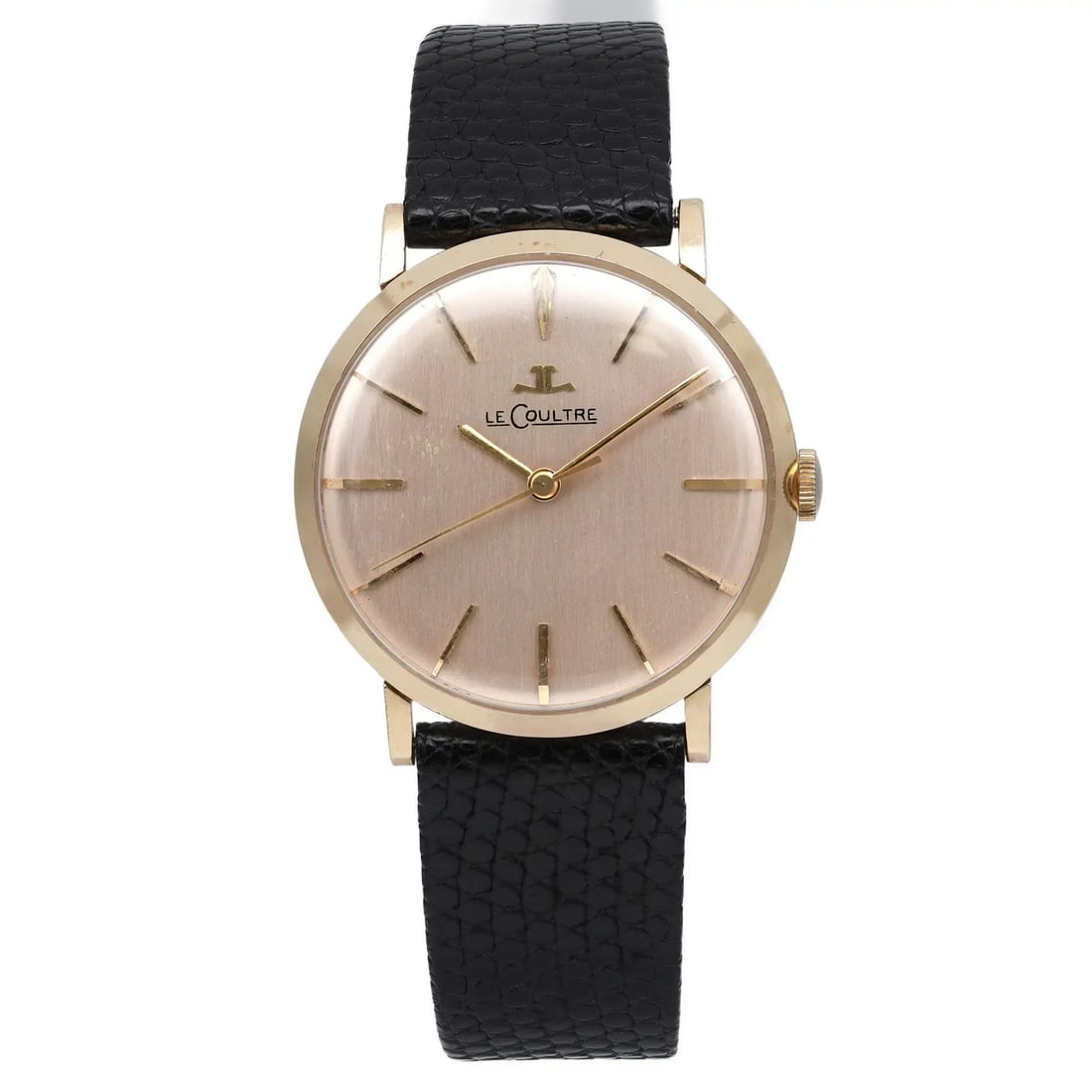 LeCoultre 32mm 14K Yellow Gold Manual Wind Watch Silver Dial: LeCoultre 32mm 14K Yellow Gold Manual Wind Watch Silver Dial This vintage LeCoultre wristwatch features a 32mm polished round case crafted from 14K yellow gold, complemented by a silver dial with stic