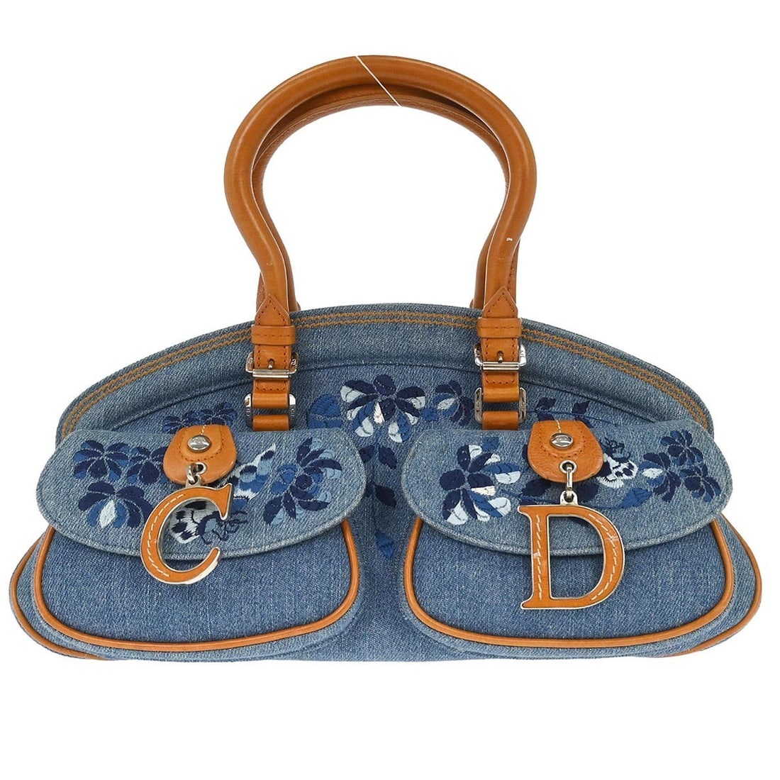 Dior Detective Medium Top Handle Bag in Blue Denim Leather: Dior Detective Medium Top Handle Bag in Blue Denim Leather Christian Dior Detective handbag in blue denim and brown leather with a structured top handle design. This medium bag is made in Italy and fe