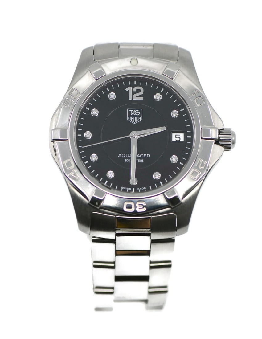 TAG Heuer Aquaracer diamond marker quartz wristwatch with box papers: TAG Heuer Aquaracer diamond marker quartz wristwatch with box papers This TAG Heuer Aquaracer wristwatch features a polished stainless steel case and bracelet, designed for men. The watch is equipped 