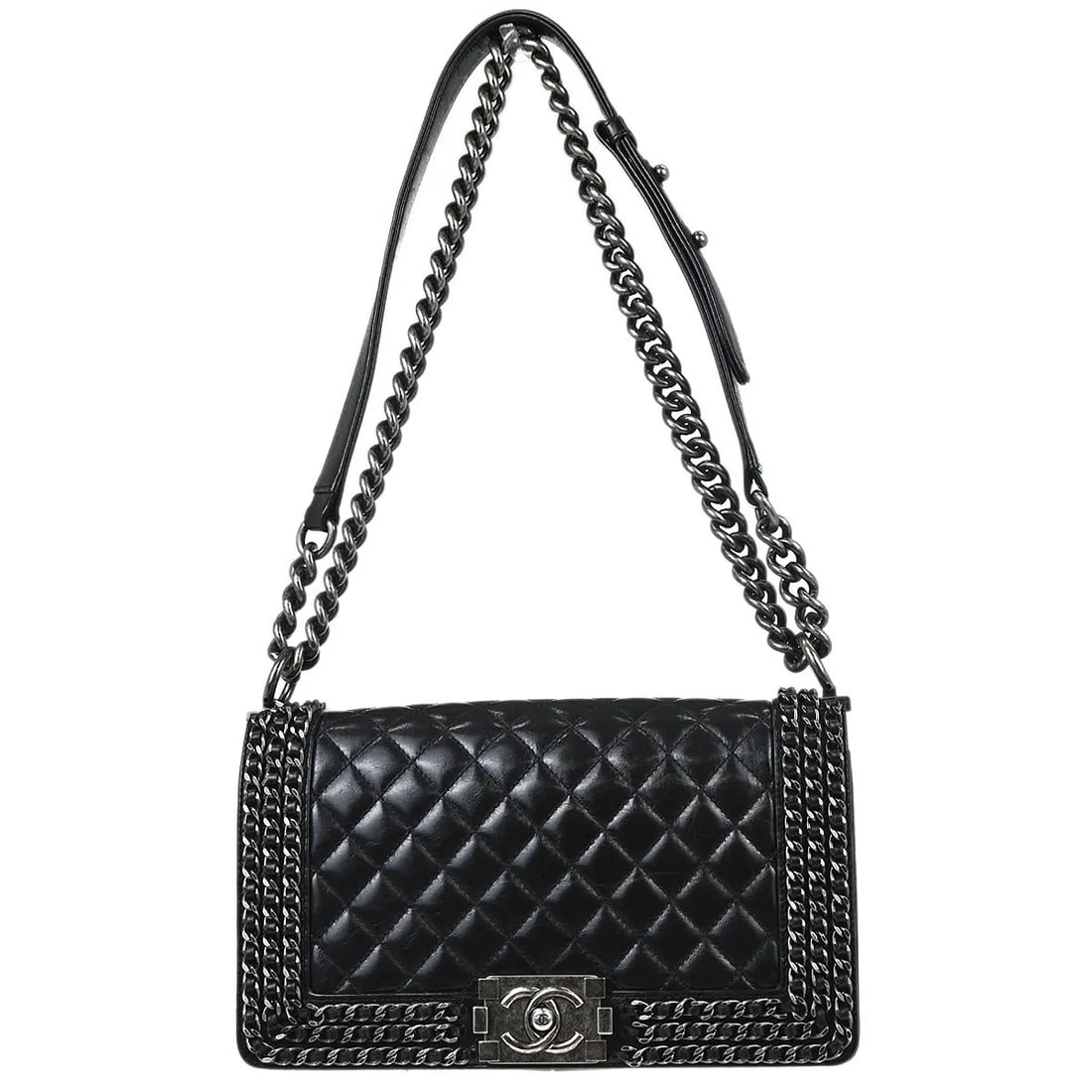 Chanel Boy Flap quilted calfskin handbag: Chanel Boy Flap quilted calfskin handbag This Chanel Boy Flap Bag features a quilted glazed calfskin leather exterior in black, offering a sophisticated and timeless look. Designed for women, the bag 