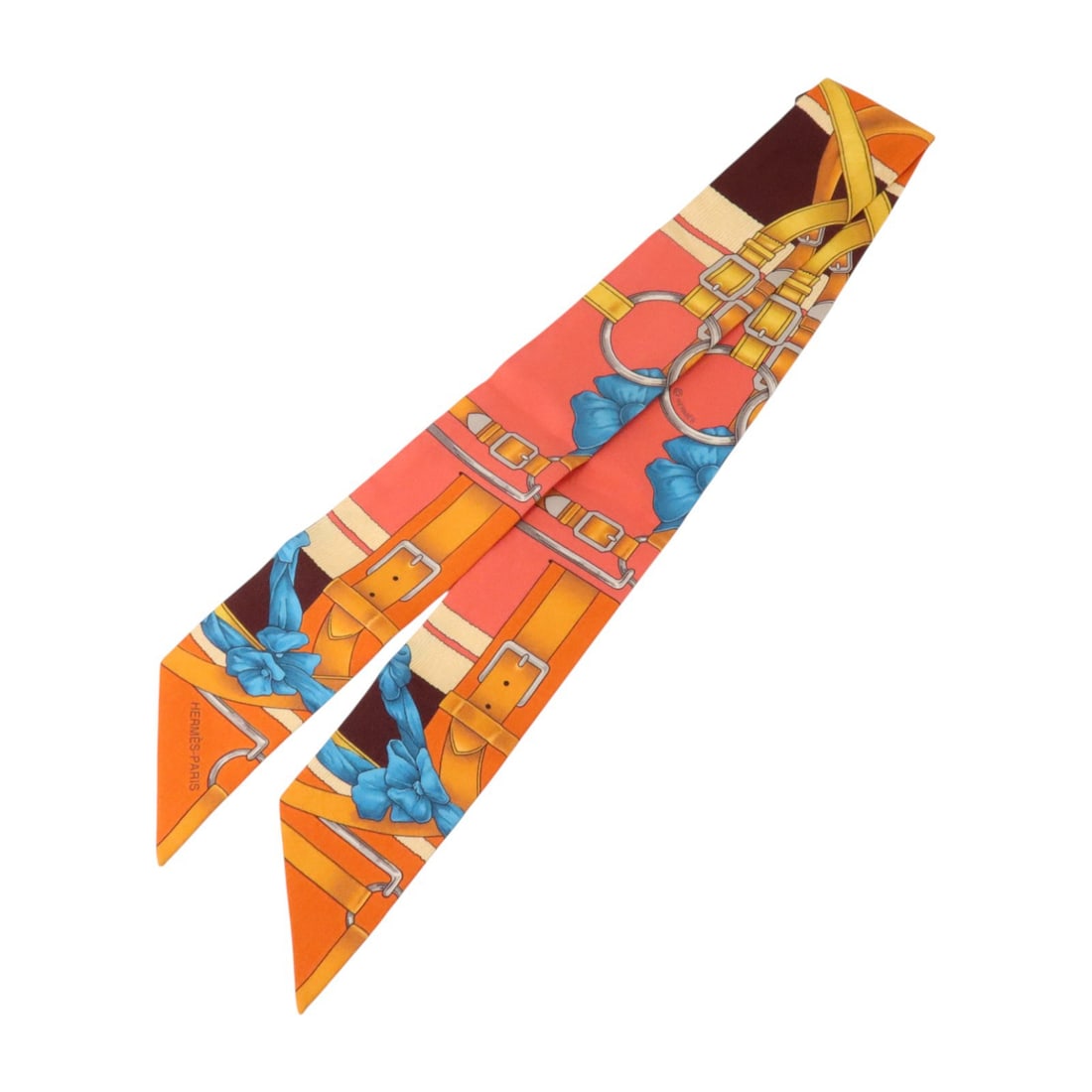 Hermes Twilly Silk Scarf Orange Pink Multicolor: Hermes Twilly Silk Scarf Orange Pink Multicolor A Hermes Twilly scarf in silk with an orange, pink, and multicolor design. It measures 86 cm x 5 cm and is offered in very good AB condition. Accessorie