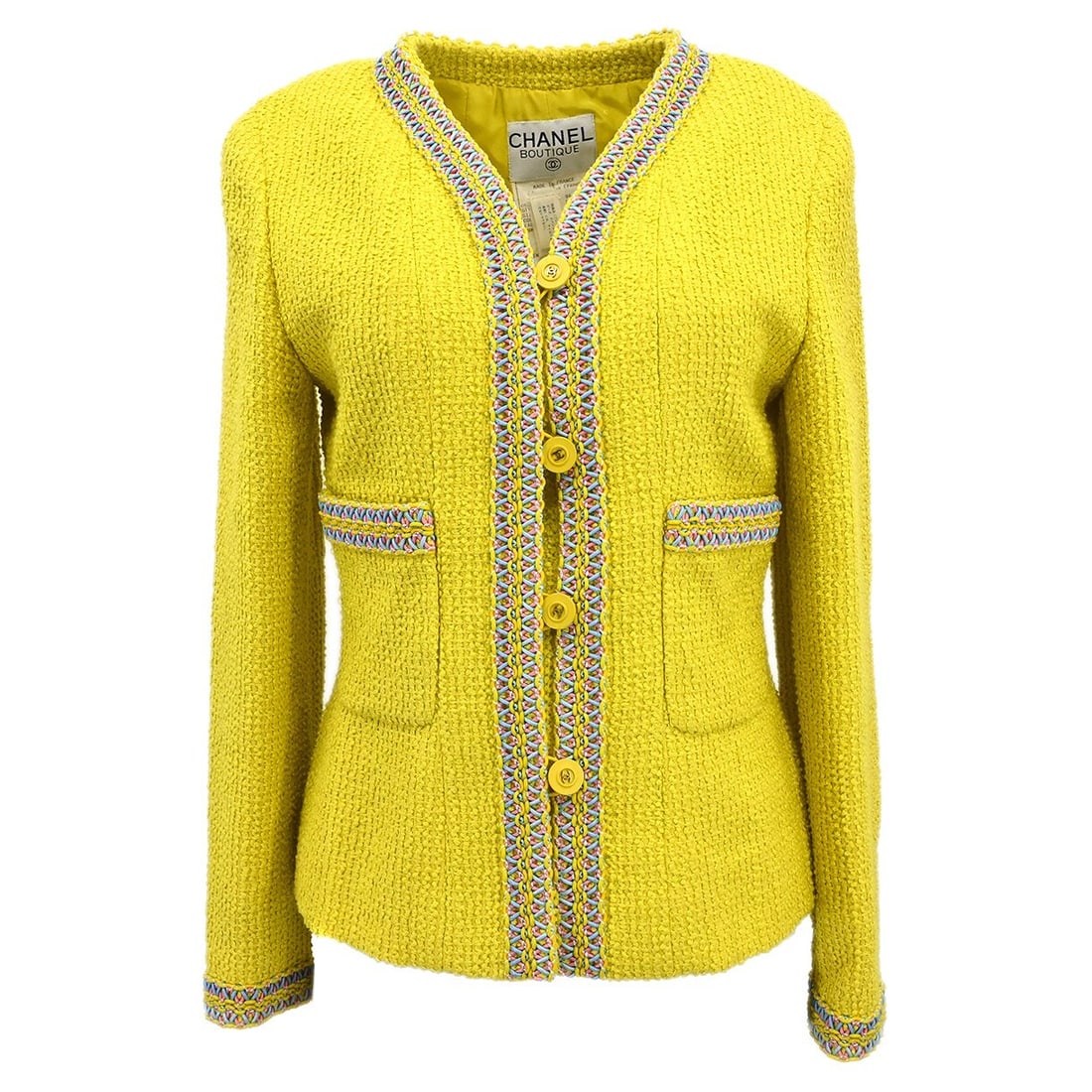 CHANEL 94P Yellow Collarless Mid Length Jacket Size 38: CHANEL 94P Yellow Collarless Mid Length Jacket Size 38 Chanel collarless jacket in yellow with a textured finish and a mid-length silhouette. Designed with long sleeves, a button front, and two exteri