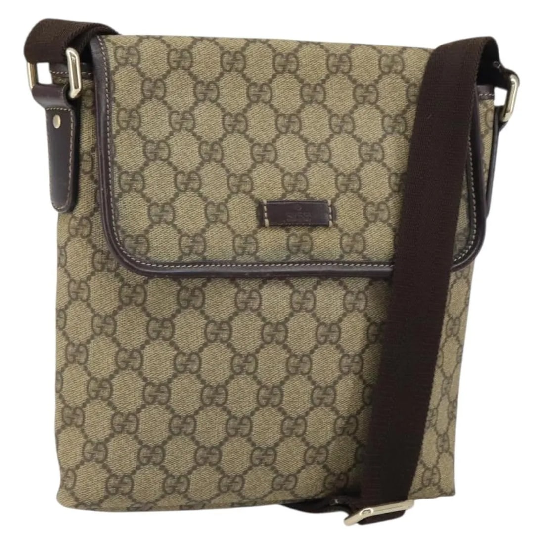 Beige PVC Flap Messenger Bag by Gucci GG Pattern Italy: Beige PVC Flap Messenger Bag by Gucci GG Pattern Italy This Gucci Flap Messenger bag is crafted from beige GG coated canvas with PVC material. Designed for women, it features a flap closure and a comp