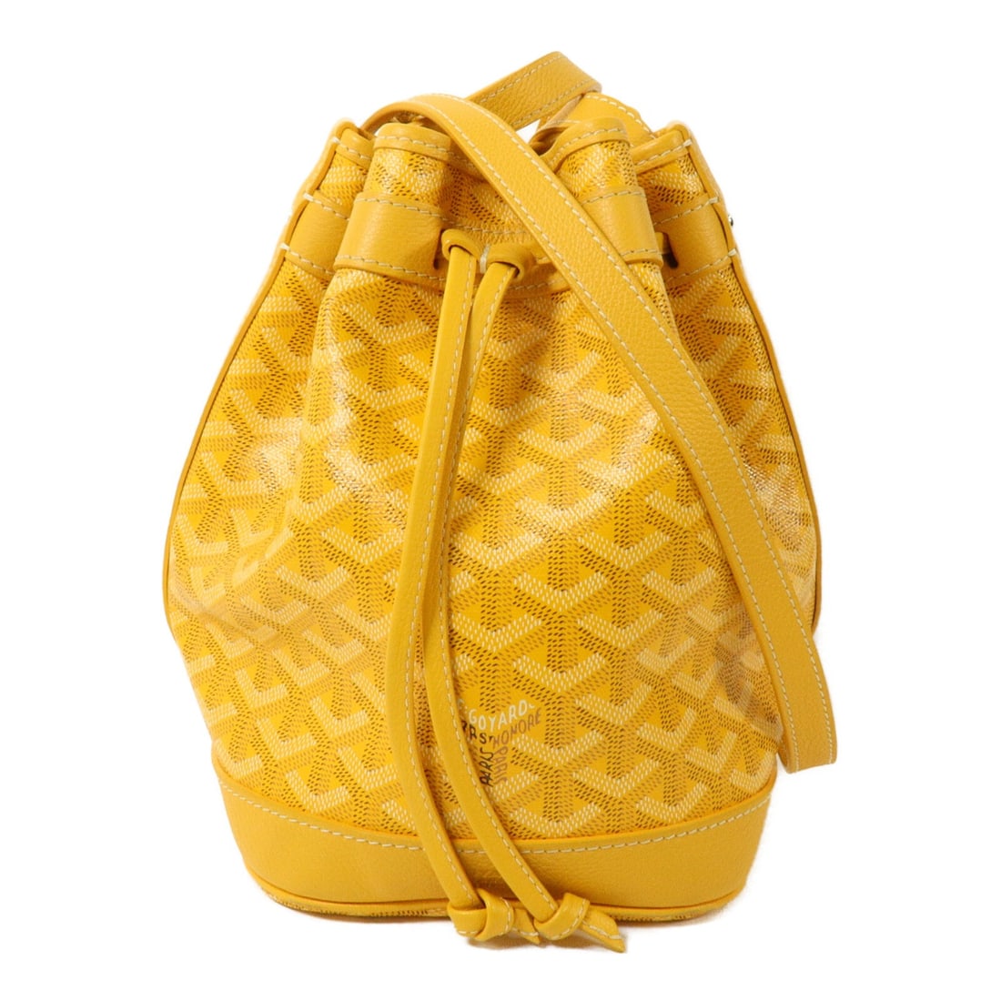 Yellow GOYARD Petit Flot bucket shoulder bag coated canvas calfskin: Yellow GOYARD Petit Flot bucket shoulder bag coated canvas calfskin A GOYARD Petit Flot bucket shoulder bag in yellow, made from PVC coated canvas and calfskin (cowhide). It features a shoulder strap 