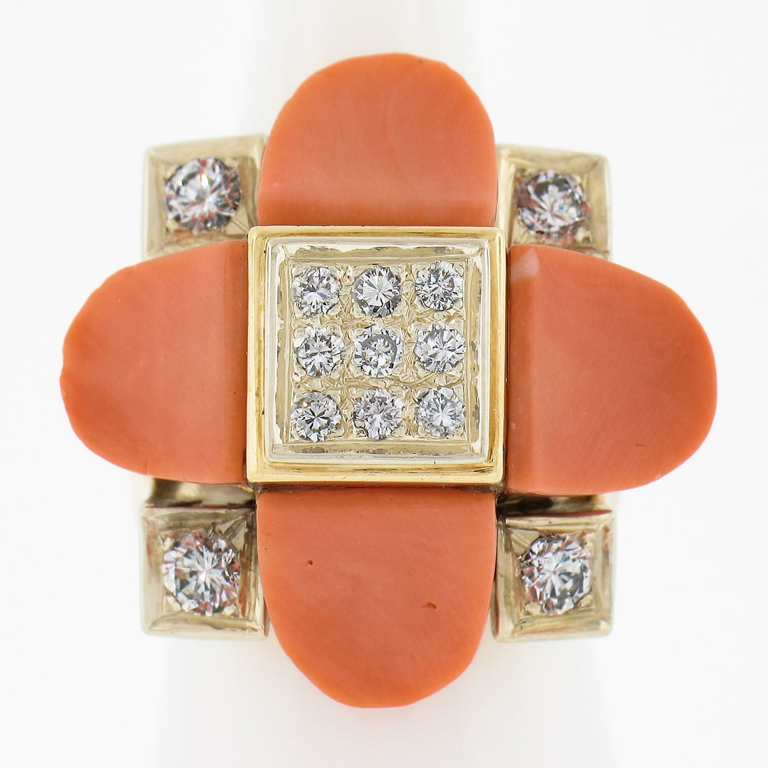 Vintage 18K Two Tone Gold Coral Diamond Cocktail Ring 0.74ctw: Vintage 18K Two Tone Gold Coral Diamond Cocktail Ring 0.74ctw Make a statement with this vintage cocktail ring, featuring a stunning combination of custom-cut pink coral and sparkling diamonds. The ri