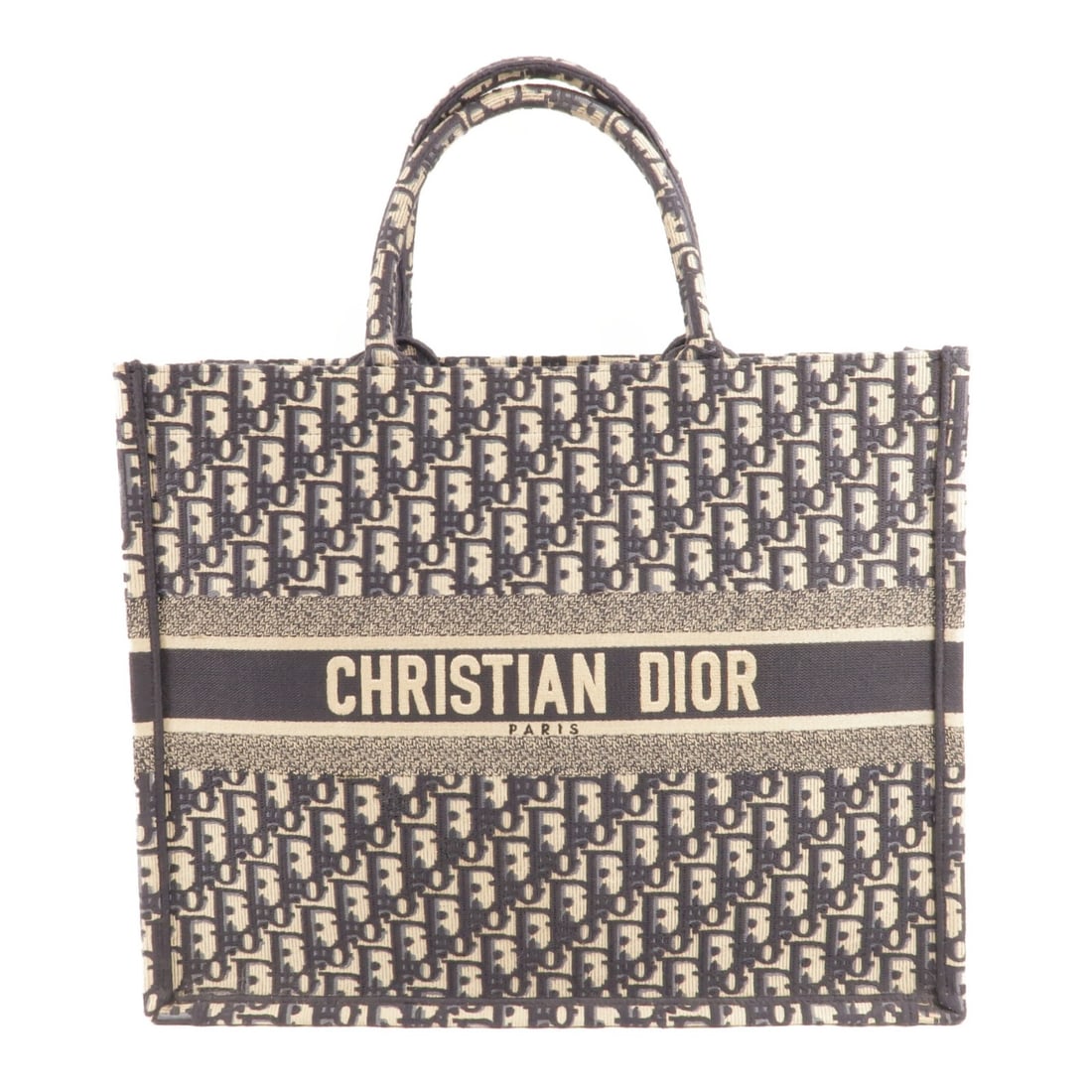 Dior CD Book Tote Large Blue Canvas Handbag: Dior CD Book Tote Large Blue Canvas Handbag Christian Dior CD Book Tote large tote bag in blue canvas. The bag is described as a very good AB condition item and comes with no accessories. It features 
