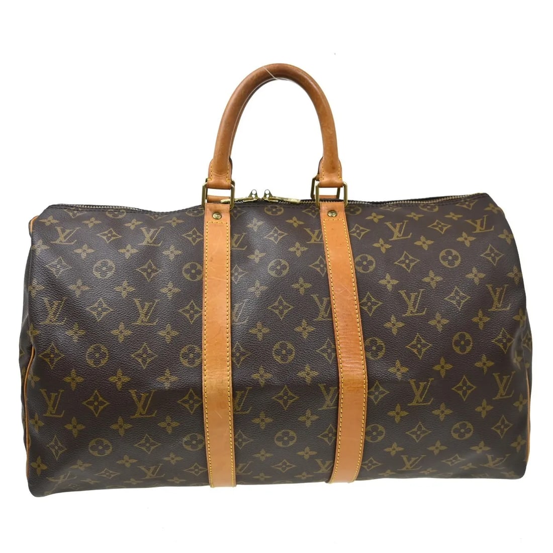 Louis Vuitton Keepall Monogram brown canvas travel bag: Louis Vuitton Keepall Monogram brown canvas travel bag Vintage Louis Vuitton Keepall in brown monogram canvas with unisex styling. This travel bag is in good overall condition with visible signs of us