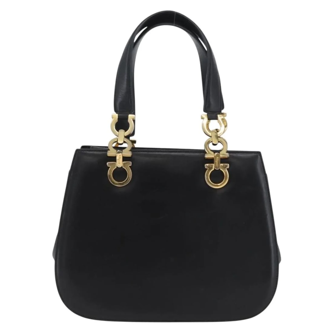 Black Leather Handbag Salvatore Ferragamo Gancini Italy: Black Leather Handbag Salvatore Ferragamo Gancini Italy This Salvatore Ferragamo Gancini handbag is crafted from black leather and designed for women. Made in Italy, the bag features a structured silh