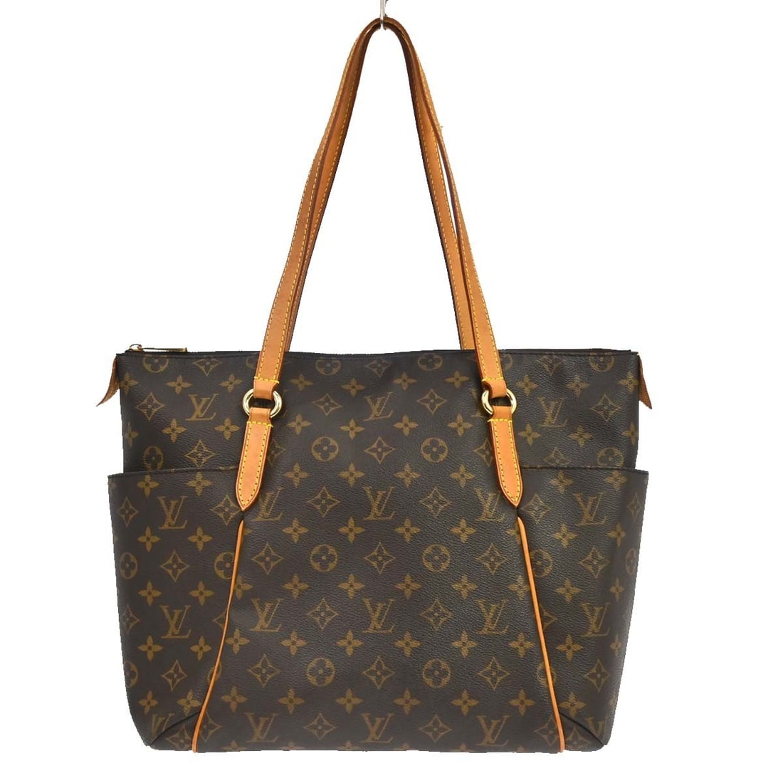 Louis Vuitton Totally MM Monogram Canvas Tote Bag M56689: Louis Vuitton Totally MM Monogram Canvas Tote Bag M56689 Vintage Louis Vuitton Totally MM shoulder tote bag in brown Monogram canvas with leather trim and double handles. This large zip-top tote featu