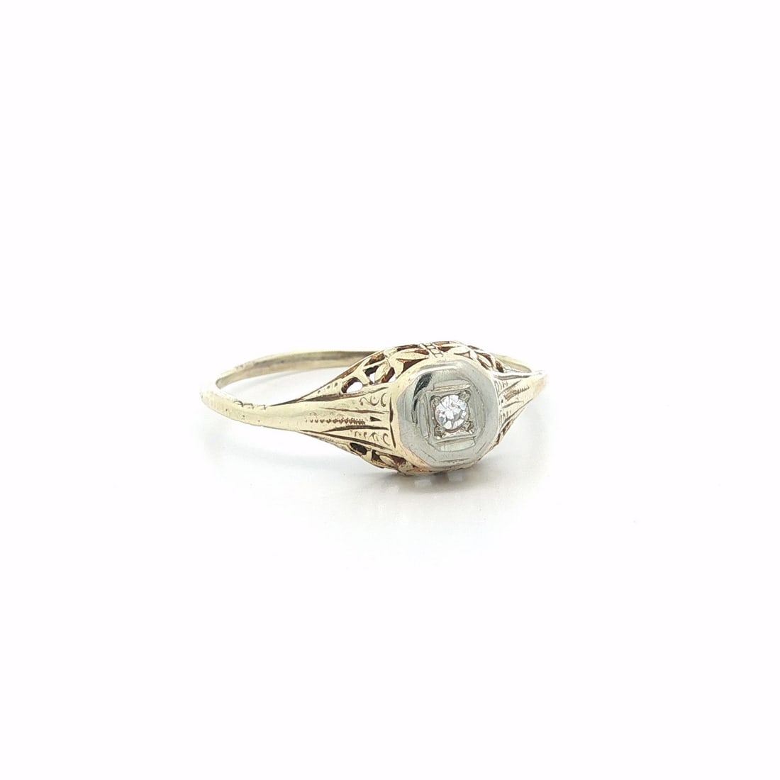 Vintage Filigree Solitaire Diamond Ring in Yellow and White Gold Size 10: Vintage Filigree Solitaire Diamond Ring in Yellow and White Gold Size 10 This dainty women's ring features a natural old single cut diamond solitaire, approximately 0.03 carats, set in an elegant fili