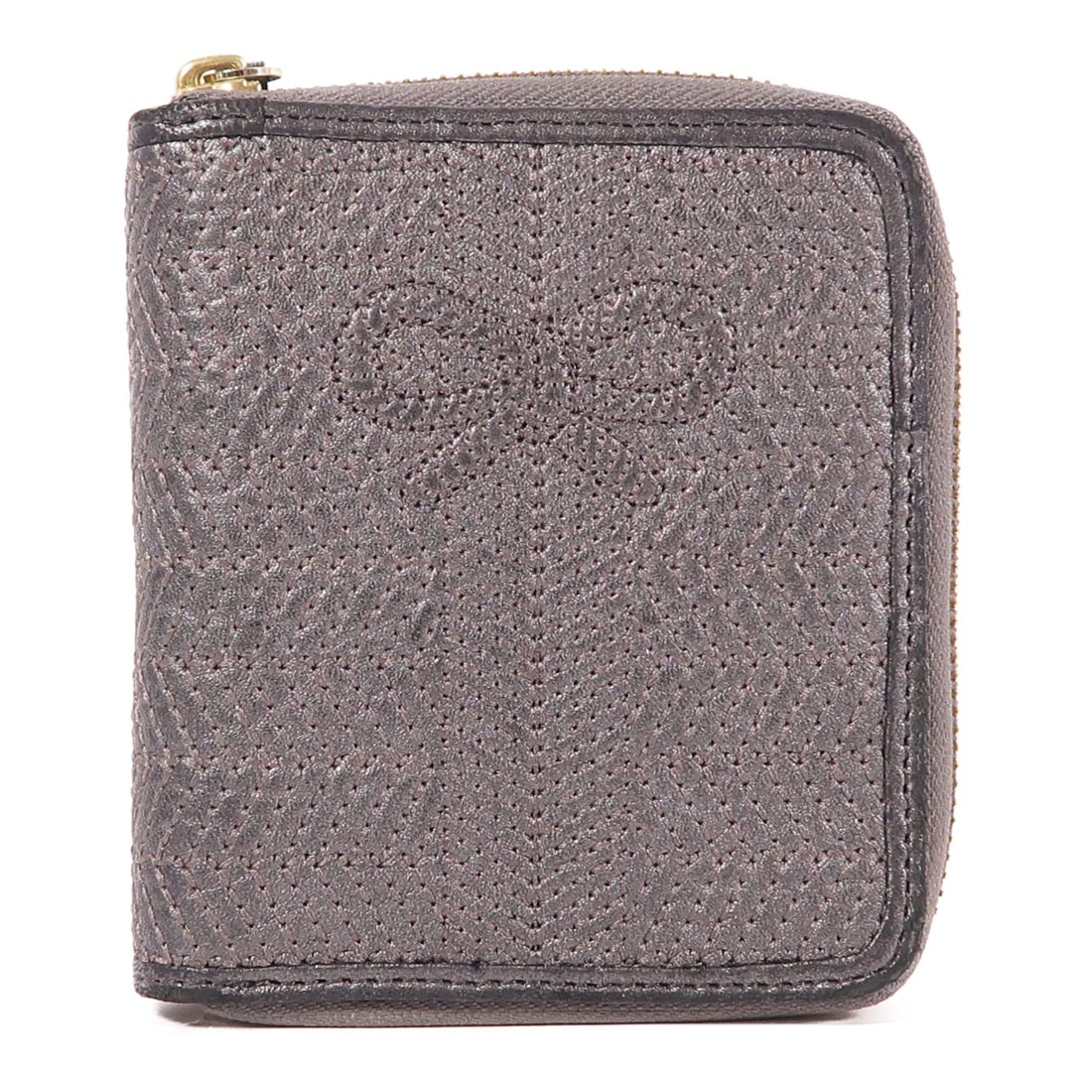 Anya Hindmarch Leather Wallet Silver Tone Hardware: Anya Hindmarch Leather Wallet Silver Tone Hardware Anya Hindmarch leather wallet in silver tone with a silver x silver color finish. It features a fastener closure, two wallet compartments, one coin c