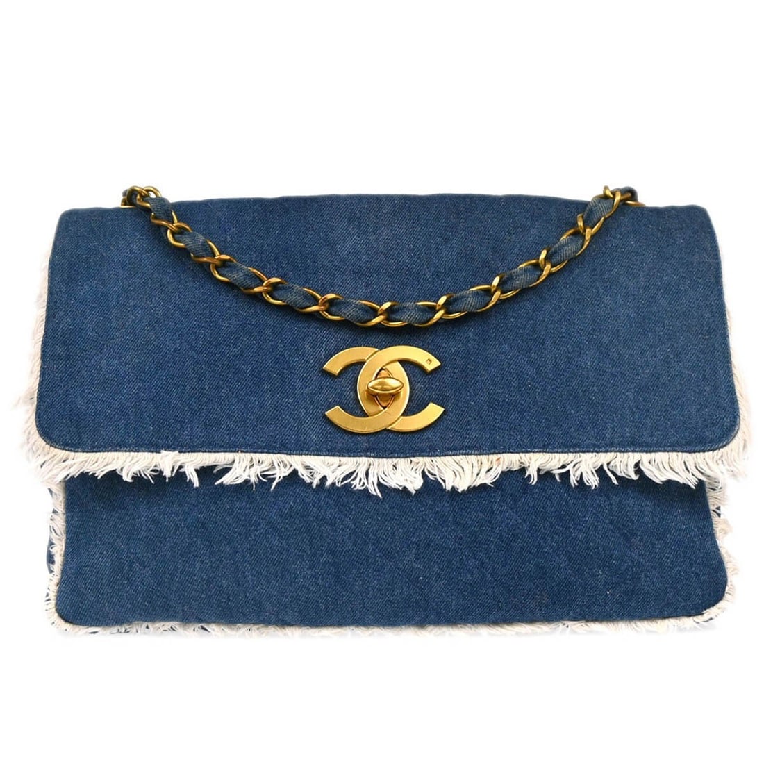 CHANEL Matelasse Quilted Denim Shoulder Bag in Blue: CHANEL Matelasse Quilted Denim Shoulder Bag in Blue Blue denim Chanel shoulder bag with a matelasse quilted design and turnlock closure. This large shoulder bag features an adjustable chain shoulder s