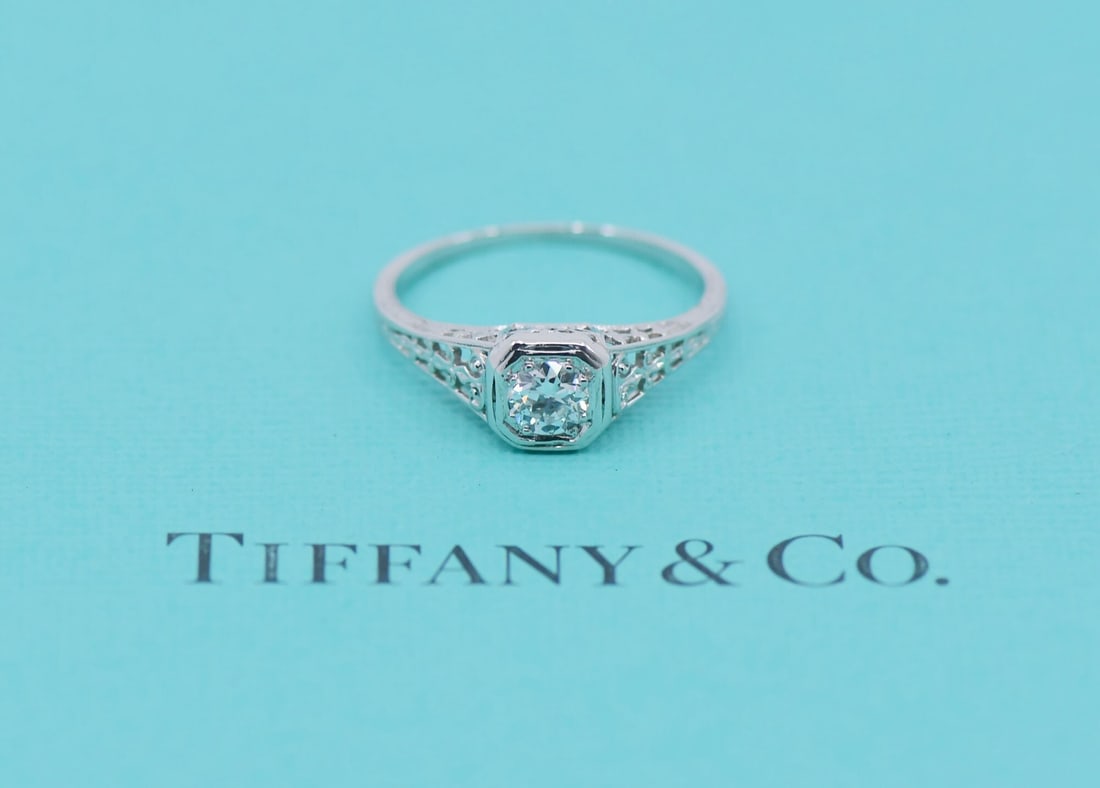 Tiffany & Co Platinum Diamond Ring 0.50 CT Size 6 Authentic: Tiffany & Co Platinum Diamond Ring 0.50 CT Size 6 Authentic This exquisite Tiffany & Co. ring showcases a stunning 0.50 CT cushion-cut diamond, elegantly set in high-quality platinum (950). Perfectly 