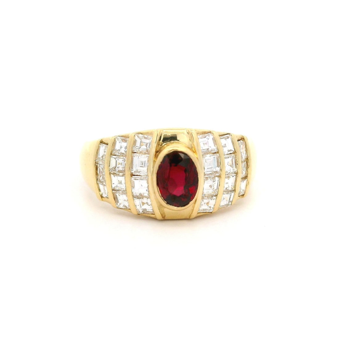 18k Yellow Gold 1.65ctw Ruby Diamond Cocktail Band Ring: 18k Yellow Gold 1.65ctw Ruby Diamond Cocktail Band Ring This exquisite cocktail band ring showcases a stunning design crafted from solid 18k yellow gold. The centerpiece is a natural, genuine oval rub