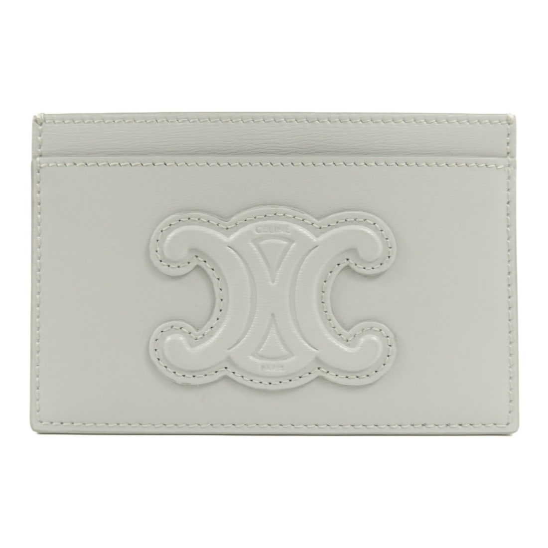 CELINE 10B703EMH calfskin card case in light blue: CELINE 10B703EMH calfskin card case in light blue This CELINE card case is crafted from calfskin (cowhide) leather in blue and light blue. It features an open pocket and two card slots, with a compact